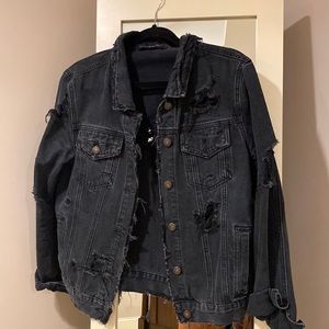 Black “destroyed” denim jacked